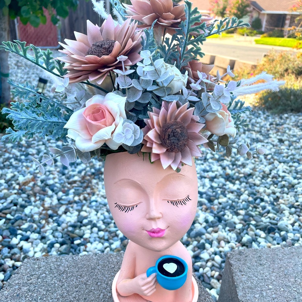 Pretty little lady enjoying her coffee. Airbrushed Sola wood sunflowers.